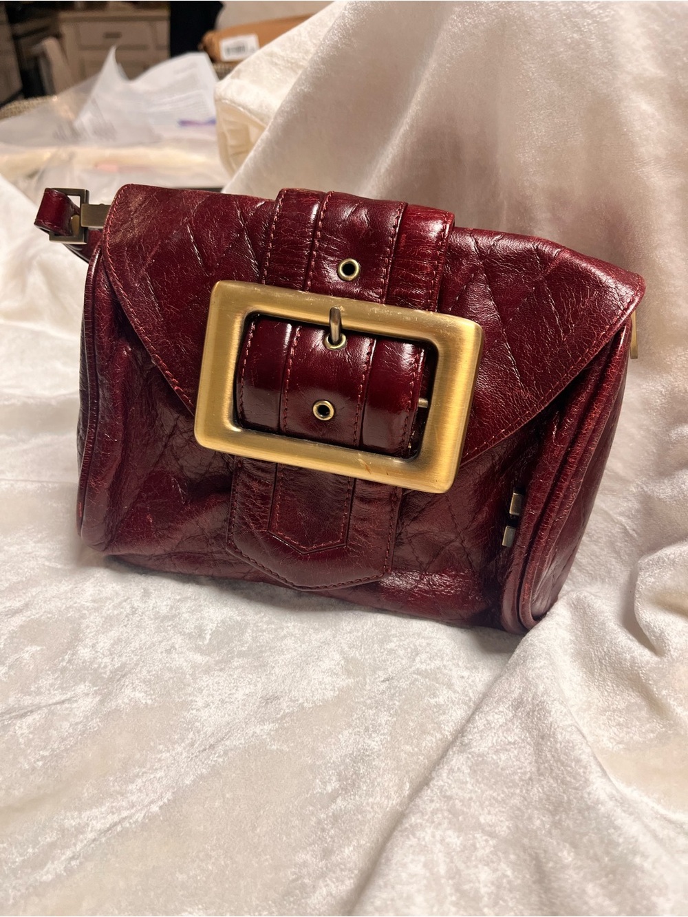 Rich Burgundy Leather Clutch with Statement Gold Buckle